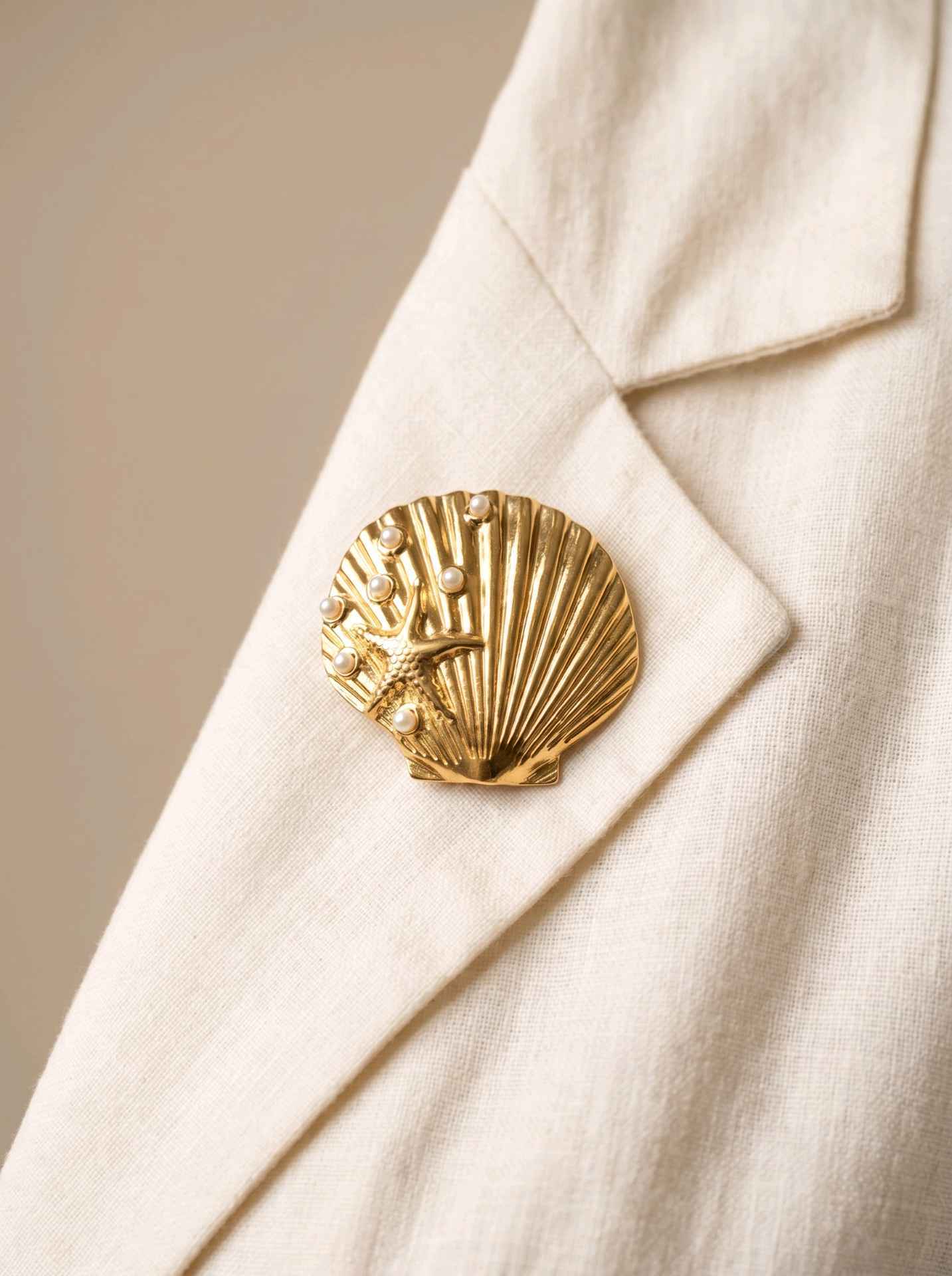 Broche en acier - Coquillage - Doré